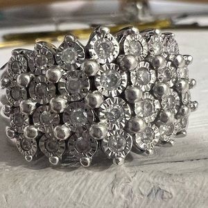 Sterling silver & real diamonds bought it at Macy’s size 7. 1/2